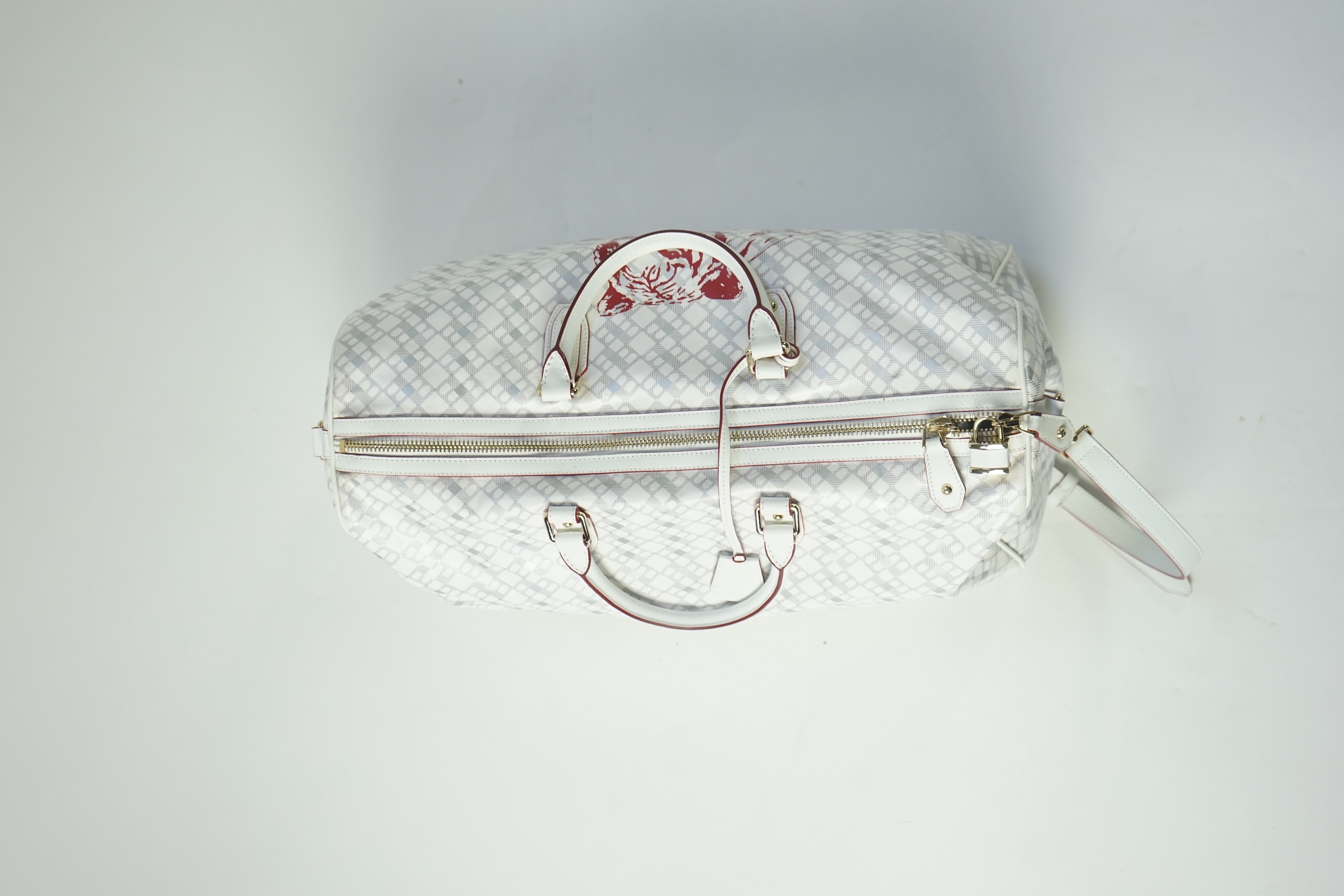 A large white monogram Bally weekend bag 'Berlinda' with red tiger detail